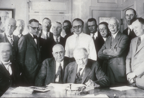 Slide of several officials signing the contract to construct Hoover Dam, April 18, 1931