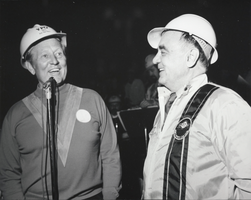 Photograph of Ellis L. Armstrong and Art Linkletter at a Young Presidents' Organization party at Hoover Dam, March 9, 1971