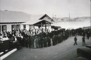Slide of the Hoover Dam construction workers lining up on payday, Boulder City, Nevada, January 25, 1932