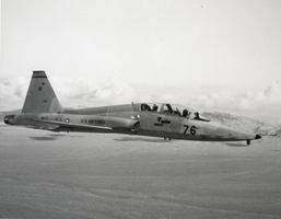 Photograph of a Northrop T-38A trainer aircraft in flight, Nellis Air Force Base, circa 1970s
