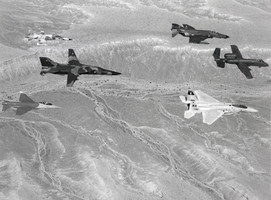 Photograph of several fighter aircraft in flight, Nellis Air Force Base, Las Vegas, circa 1970s