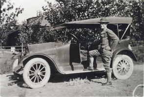 Photograph of Earle Eglington and his first car, circa early 1900s