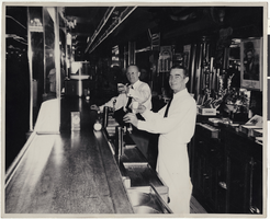 Photograph of two men working at the Apache Bar, Las Vegas, Nevada, circa 1930s-1950s