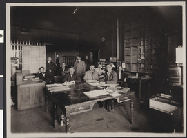 Photograph of Lester Stocker and others in a telegraph office, Winslow, Arizona, circa 1909
