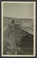 Photograph of a burned railroad trestle, circa 1910s-1930s