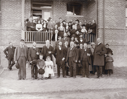 Photograph of people outside of the Indian Institute, Pine Ridge, South Dakota, February, 1902