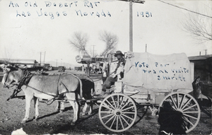 Postcard showing a man sitting in a miniature covered wagon, Las Vegas, Nevada, 1931