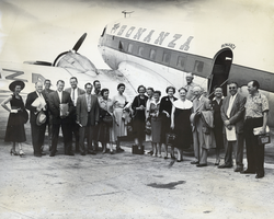 Photograph of people beside Bonanza aircraft, Las Vegas, circa 1945-1950s