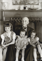 Photograph of C. P. Squires with three of his great-grandchildren, 1947
