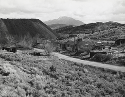 Film transparency of a mining town with tailings, unknown location, possibly Nevada, 1961