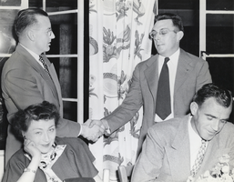 Film transparency of the outgoing President of Boulder City Jaycees congratulating the incoming President Tom Sullivan, Boulder City, Nevada, circa 1948