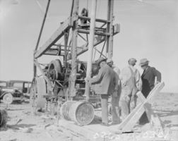 Film transparency of a group of unidentified men drilling for oil in the Las Vegas valley, Nevada, circa 1930-1932