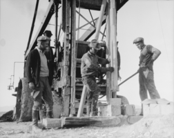 Film transparency of a group of unidentified men drilling for oil in the Las Vegas valley, Nevada circa 1930-1932