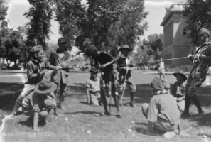 Film transparency of boy scouts (some wearing blackface) playing at a Labor Day Parade in Las Vegas, Nevada, circa 1930