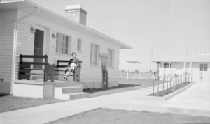 Photograph of Mayme Stocker in front of the Stocker home Las Vegas, Nevada, circa 1930's-1950's