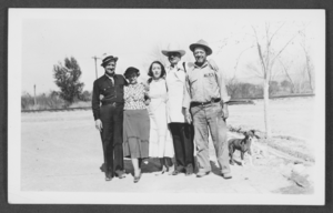 Photograph of Harold, Mayme, Geraldine Stocker and an unidentified man at the Overton Mill, Overton, Nevada, circa 1932-1940s