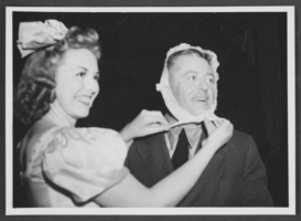 Photograph of Harold Stocker and a cocktail waitress, Southgate, California, circa 1940-1950s