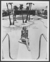 Photograph of a woman at the swimming pool at the Landmark Hotel, Las Vegas, Nevada, circa 1969-early 1970s