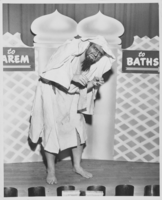 Photograph of a costumed male entertainer at the Aladdin Hotel, Las Vegas, Nevada, circa 1966-1970s