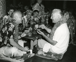 Photograph of Wilbur and Toni Clark with William and Grace Boyd at Don the Beachcomber's, Waikiki Beach, Honolulu, Hawaii, circa 1947-1950s