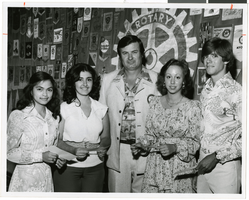 Photograph of Las Vegas, Nevada Rotary scholarship winners with Rotarian Dave Wells, Las Vegas, Nevada, September 22, 1976