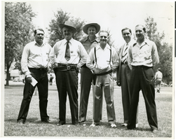 Photograph of Wilbur Clark with a group of unidentifed men, circa late 1920s-early 1930s