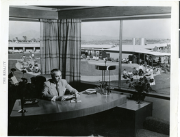 Photograph of Wilbur Clark at his desk in the Desert Inn, Las Vegas, Nevada, circa 1950s