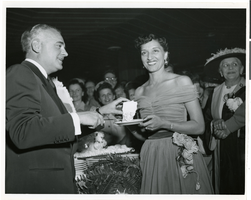 Photograph of Wilbur and Toni Clark at a party celebrating the first anniversary of the Desert Inn, Las Vegas, Nevada, April 1951