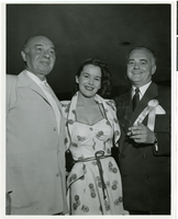 Photograph of Wilbur Clark, Joe Bock and an unidentified woman at the Desert Inn's first anniversary party, Las Vegas, Nevada, April 1951