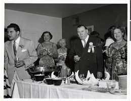 Photograph of Liberace, Tommy McGinty and others at the Desert Inn's first anniversary party, Las Vegas, Nevada, April 1951