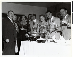 Photograph of Libearce and others at the Desert Inn first anniversary party, Desert Inn, Las Vegas, April 1951