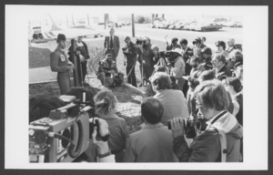 Photograph of Captain Dale Cooke speaking to the press at Nellis Air Force Base, Nevada, January 20, 1982