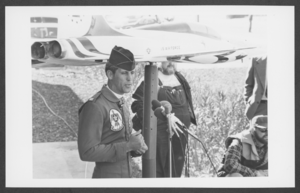 Photograph of Captain Dale Cooke speaking to the press at Nellis Air Force Base, Nevada, January 20, 1982