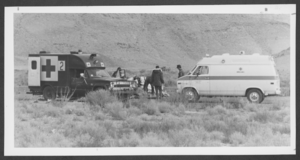 Photograph of ambulances at the site of a fatal Thunderbirds plane crash, Indian Springs, Nevada, January 19, 1982