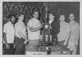 Photograph of the Nellis Bowling Team after winning a military bowling competition, Las Vegas, Nevada, February 9, 1974