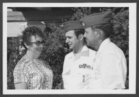 Photograph of Anne Hansen, Staff Sargeant Thomas Moore and Lieutenant Colonel B. G. Harris, Nellis Air Force Base, Nevada, July 1, 1976