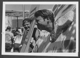 Photograph of men participating in a carnival game at a U.S. bicentennial picnic, Nellis Air Force Base, Nevada, July 12, 1976