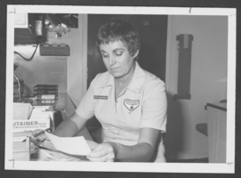 Photograph of Red Cross volunteer, Royella Shrewsbery, at Nellis Air Force Base, Nevada, July 15, 1977