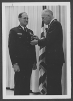 Photograph of Lieutenant Colonel Donald Waltman receiving medals, Nellis Air Force Base, Nevada, January 16, 1975