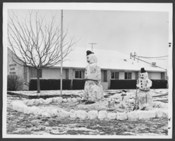 Photograph of a snowmen on the lawn of a fire station, North Las Vegas, Nevada, January, 1974