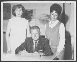 Photograph of Mayor William Taylor signing a proclamation creating Constitution Week, North Las Vegas, Nevada, September, 24, 1964