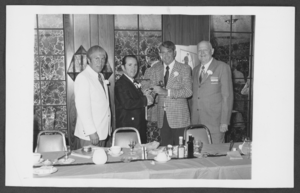 Photograph of Wendell Tobler receiving gavel as new president of the North Las Vegas Chamber of Commerce, North Las Vegas, Nevada, July, 1973