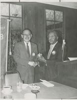 Photograph of Bob Duckett presents an award to past president Morton Karsh, North Las Vegas, Nevada, August 17, 1972