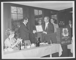Photograph of Jerry Mahanke presenting North Las Vegas Breakfast Exchange Club charter to Noel Thompson, North Las Vegas, Nevada, September 9, 1972