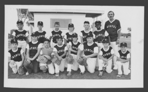 Photograph of the Pee Wee "Coyotes" Little League baseball team and their coach, North Las Vegas, Nevada, May 28, 1975