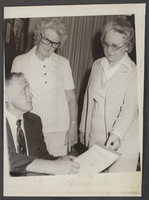 Photograph of Mayor Ray Daines signing a proclamation, May 28, 1978