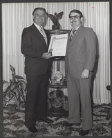 Photograph of Las Vegas Mayor Bill Briare with proclamation, March 15, 1981