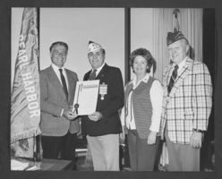 Photograph of Las Vegas Mayor Bill Briare with Veterans of Foreign Wars members on the 40th anniversary of Pearl Harbor. location unknown, December 2, 1981