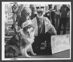 Photograph of dog and owner at Fremont Street celebration, Las Vegas, circa 1980
