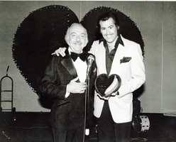 Photograph of Wayne Newton with an unidentified man, unknown location, circa 1970s